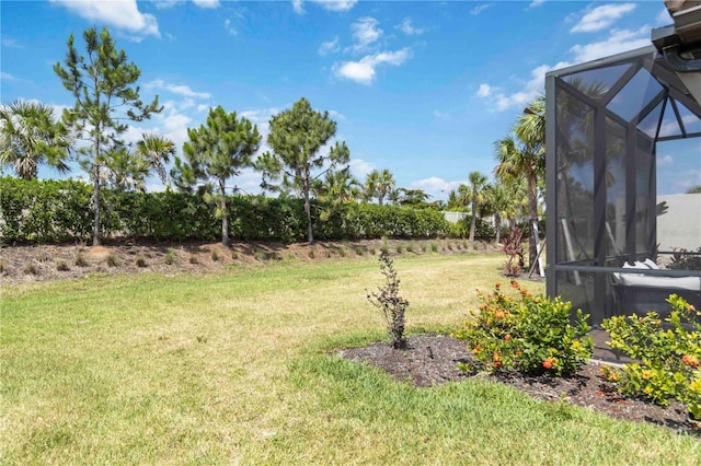 15752 Sacile Ln, Bradenton, FL 34211 - view of green lawn with glass enclosure