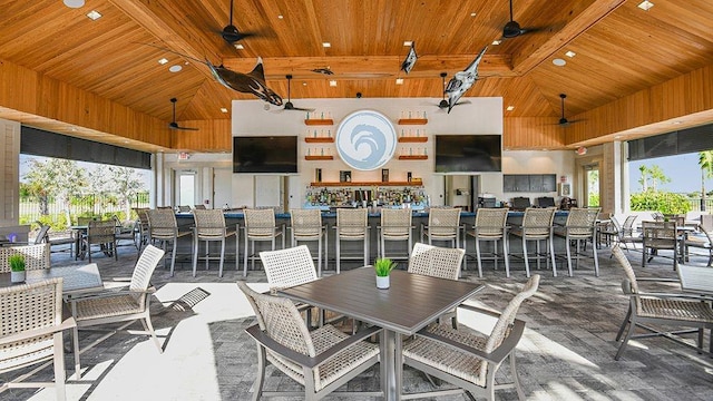 15752 Sacile Ln, Bradenton, FL 34211 - view of patio / terrace with a ceiling fan, an outdoor bar, and outdoor dining space