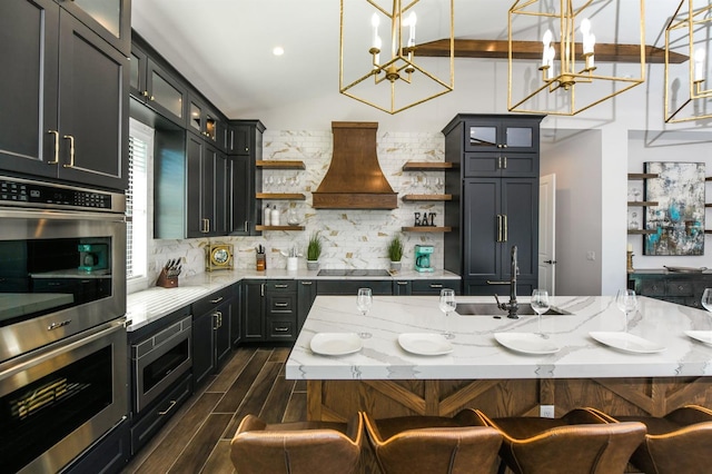 340 Jackson Dr, Sarasota, FL 34236 - kitchen featuring open shelves, appliances with stainless steel finishes, premium range hood, a sink, and a chandelier