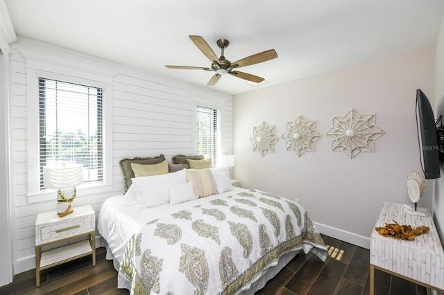 340 Jackson Dr, Sarasota, FL 34236 - bedroom featuring wood finished floors, a ceiling fan, and baseboards