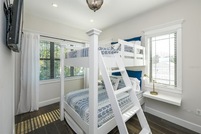 340 Jackson Dr, Sarasota, FL 34236 - bedroom featuring baseboards, wood tiled floors, decorative columns, and recessed lighting