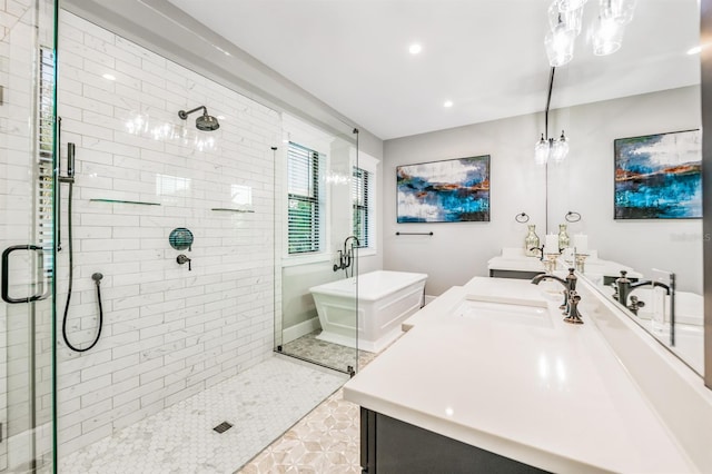 340 Jackson Dr, Sarasota, FL 34236 - bathroom featuring a stall shower, vanity, and a soaking tub