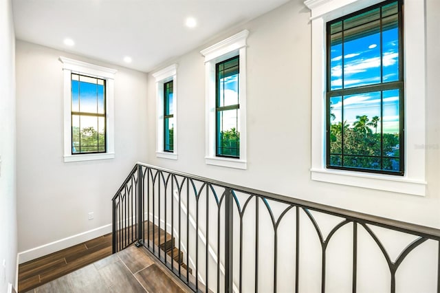 340 Jackson Dr, Sarasota, FL 34236 - stairway featuring wood finished floors, baseboards, and recessed lighting