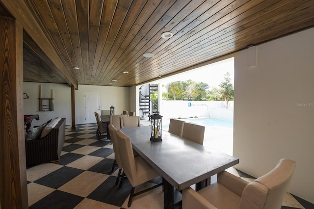 340 Jackson Dr, Sarasota, FL 34236 - dining space featuring wood ceiling and tile patterned floors