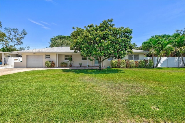1324 Augusta Ln S, Saint Petersburg, FL 33707 - view of front facade with an attached garage, driveway, and stucco siding