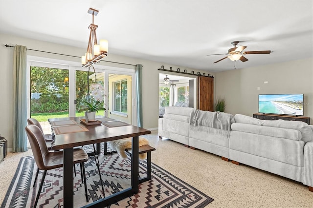 1324 Augusta Ln S, Saint Petersburg, FL 33707 - dining space featuring speckled floor, a ceiling fan, and a chandelier