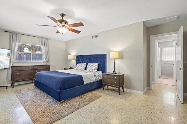 1324 Augusta Ln S, Saint Petersburg, FL 33707 - bedroom featuring baseboards, speckle patterned floor, and a ceiling fan