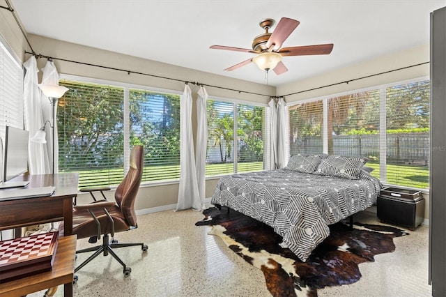 1324 Augusta Ln S, Saint Petersburg, FL 33707 - bedroom with speckle patterned floor, baseboards, and access to exterior