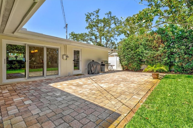 1324 Augusta Ln S, Saint Petersburg, FL 33707 - view of patio / terrace featuring a grill