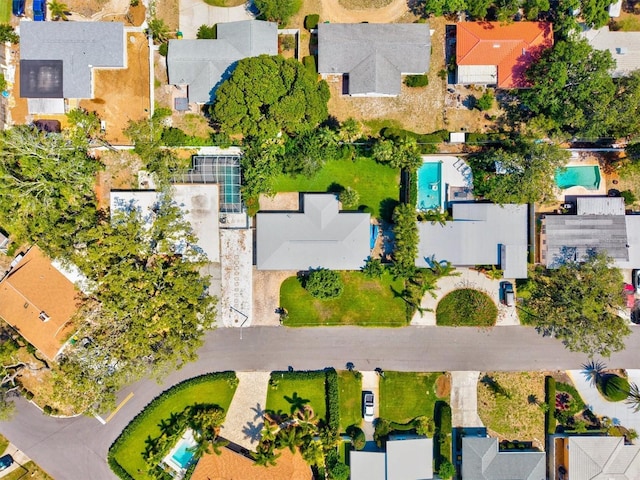 1324 Augusta Ln S, Saint Petersburg, FL 33707 - aerial perspective of suburban area with a pool area