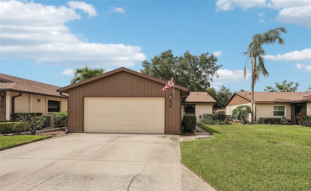 532 Oak Hill Cir Unit 12, Sarasota, FL 34232 - single story home featuring a front yard, driveway, and a garage