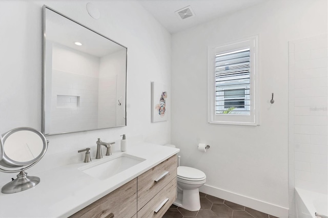 8069 Tidal Pointe Way, Sarasota, FL 34240 - full bathroom with vanity, toilet, tile patterned floors, baseboards, and shower / washtub combination