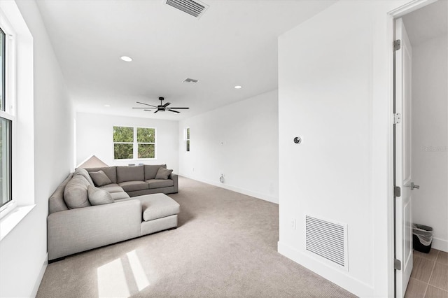 8069 Tidal Pointe Way, Sarasota, FL 34240 - living room featuring recessed lighting, ceiling fan, baseboards, and light colored carpet