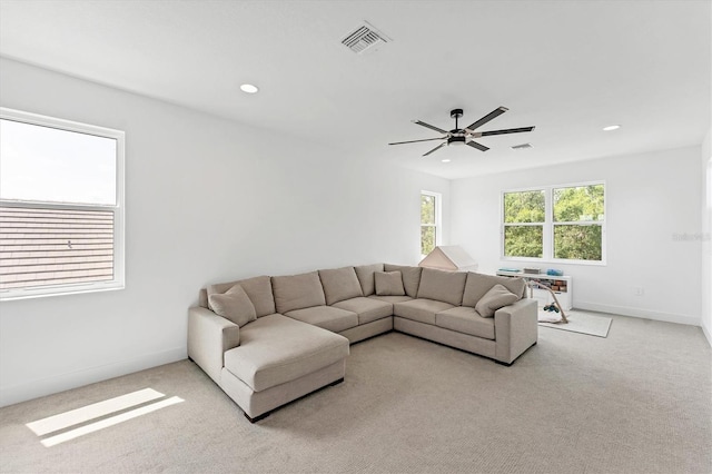 8069 Tidal Pointe Way, Sarasota, FL 34240 - living room with a ceiling fan, light colored carpet, recessed lighting, and baseboards