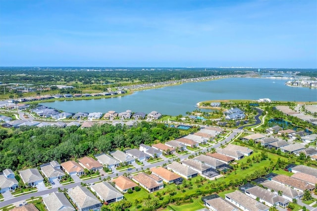 8069 Tidal Pointe Way, Sarasota, FL 34240 - aerial view of property and surrounding area featuring a nearby body of water and nearby suburban area