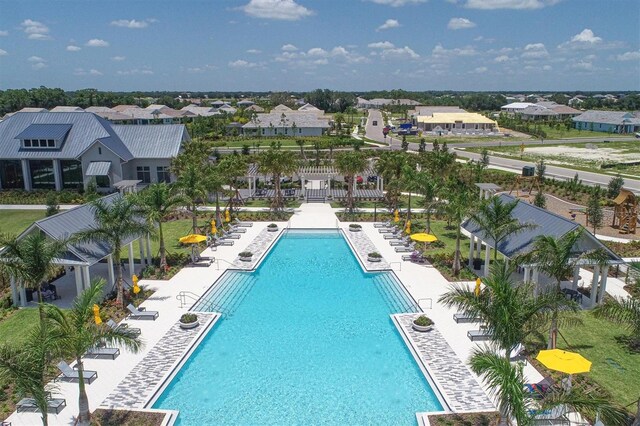 8069 Tidal Pointe Way, Sarasota, FL 34240 - community pool featuring a residential view