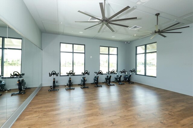 8069 Tidal Pointe Way, Sarasota, FL 34240 - gym with light wood-style flooring, recessed lighting, and ceiling fan