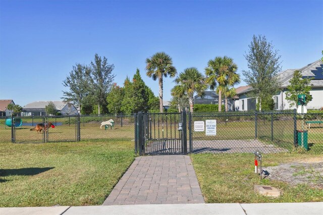 8069 Tidal Pointe Way, Sarasota, FL 34240 - gate with a residential view