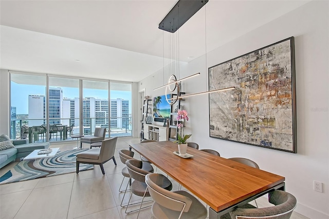 301 Quay Commons Unit 1208, Sarasota, FL 34236 - dining area featuring tile patterned floors and a view of city