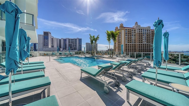 301 Quay Commons Unit 1208, Sarasota, FL 34236 - community pool with a patio and a city view