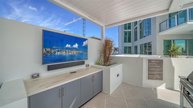 301 Quay Commons Unit 1208, Sarasota, FL 34236 - view of patio / terrace featuring an outdoor kitchen