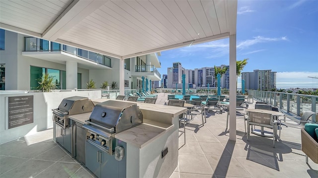 301 Quay Commons Unit 1208, Sarasota, FL 34236 - view of patio featuring a view of city