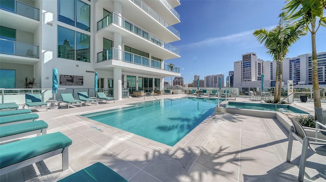 301 Quay Commons Unit 1208, Sarasota, FL 34236 - community pool with a city view and a patio area