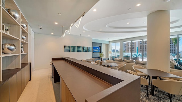 301 Quay Commons Unit 1208, Sarasota, FL 34236 - bar with recessed lighting, built in features, and baseboards