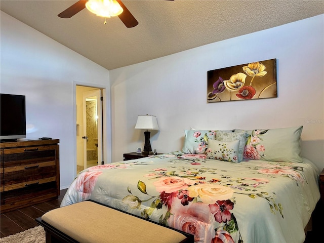 5400 34th St W Unit H12, Bradenton, FL 34210 - bedroom featuring wood finished floors, lofted ceiling, ensuite bathroom, and a ceiling fan