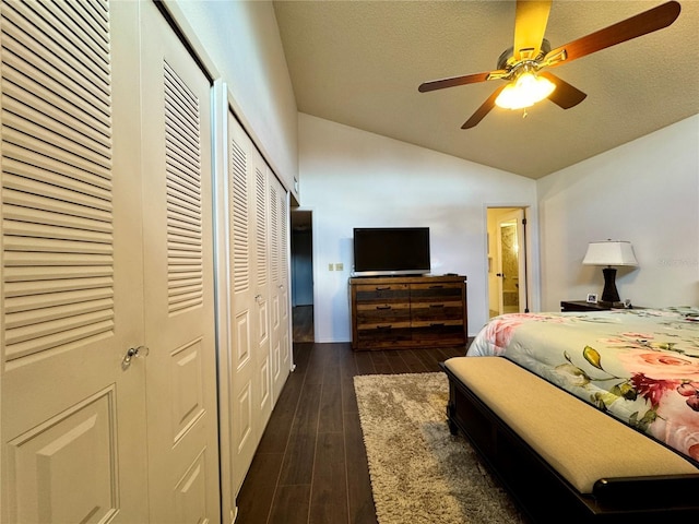 5400 34th St W Unit H12, Bradenton, FL 34210 - bedroom featuring vaulted ceiling, dark wood finished floors, ensuite bath, and ceiling fan