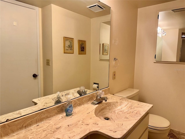 5400 34th St W Unit H12, Bradenton, FL 34210 - bathroom featuring toilet and vanity
