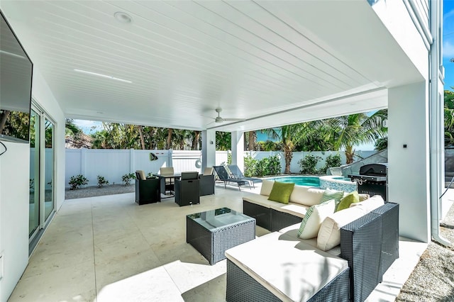 5219 Calle Menorca, Sarasota, FL 34242 - fenced backyard with outdoor dining space, a patio, an outdoor living space, a pool with connected hot tub, and a grill