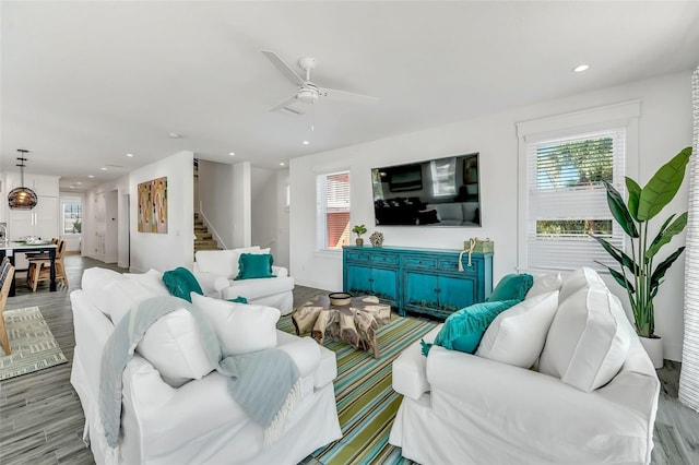 5219 Calle Menorca, Sarasota, FL 34242 - living area with wood finished floors, recessed lighting, stairs, baseboards, and ceiling fan