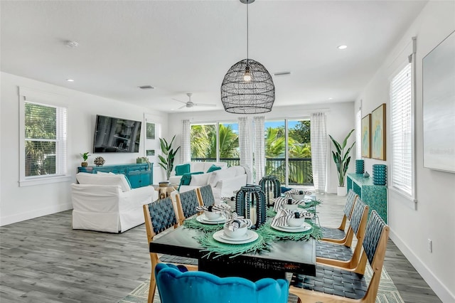 5219 Calle Menorca, Sarasota, FL 34242 - dining space with wood finished floors, baseboards, ceiling fan, and recessed lighting