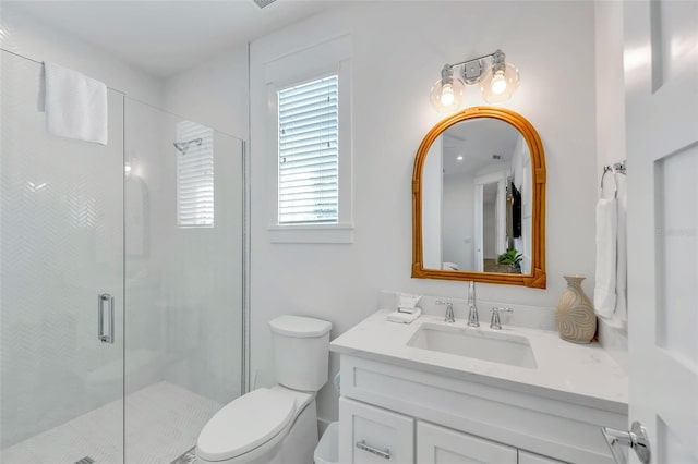 5219 Calle Menorca, Sarasota, FL 34242 - full bathroom featuring toilet, vanity, and a stall shower
