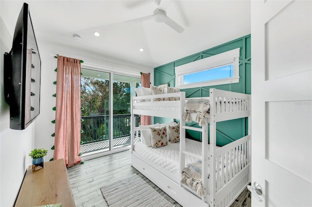 5219 Calle Menorca, Sarasota, FL 34242 - bedroom featuring access to exterior, multiple windows, recessed lighting, wood finished floors, and ceiling fan