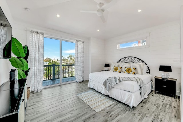 5219 Calle Menorca, Sarasota, FL 34242 - bedroom with access to exterior, light wood-type flooring, a ceiling fan, wooden walls, and recessed lighting