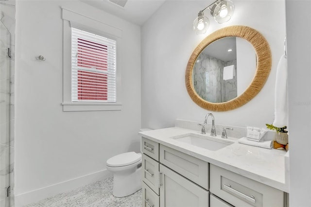 5219 Calle Menorca, Sarasota, FL 34242 - full bathroom featuring vanity, a marble finish shower, toilet, baseboards, and tile patterned floors