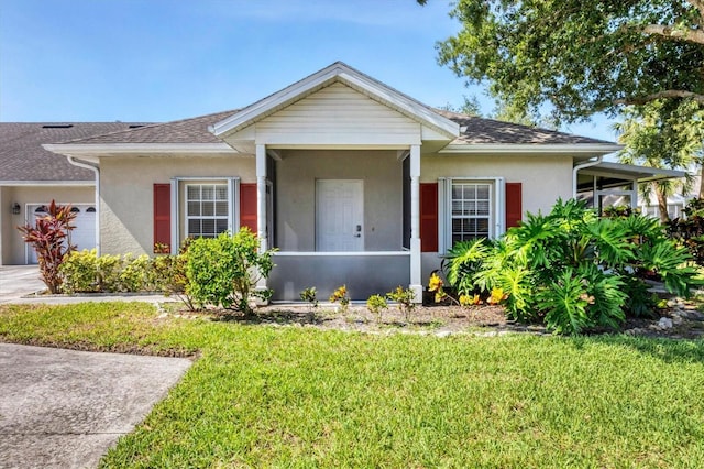1516 Red Oak Ln, Port Charlotte, FL 33948 - view of front facade with stucco siding, a front lawn, roof with shingles, and a garage