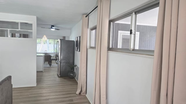 3730 Ferguson St, Sarasota, FL 34233 - corridor featuring wood finished floors and baseboards