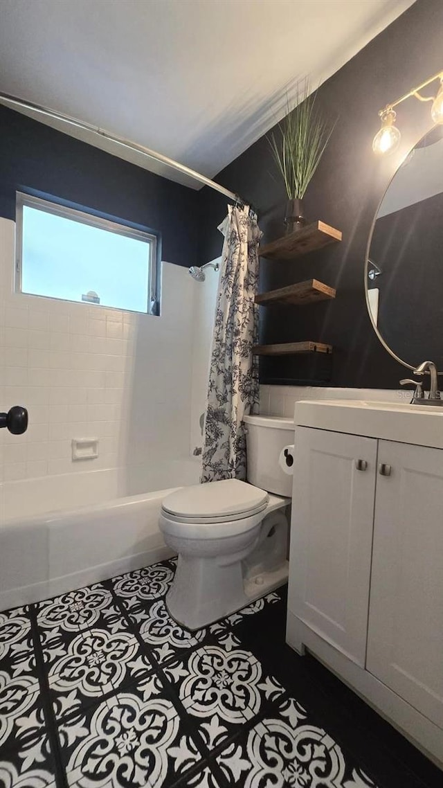 3730 Ferguson St, Sarasota, FL 34233 - bathroom with toilet, vanity, shower / bath combo, and tile patterned floors