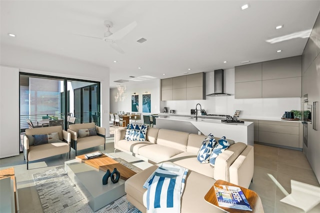 100 6th St S, Bradenton Beach, FL 34217 - living room featuring a ceiling fan and light tile patterned floors
