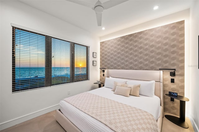 100 6th St S, Bradenton Beach, FL 34217 - bedroom featuring wallpapered walls, baseboards, recessed lighting, a ceiling fan, and an accent wall