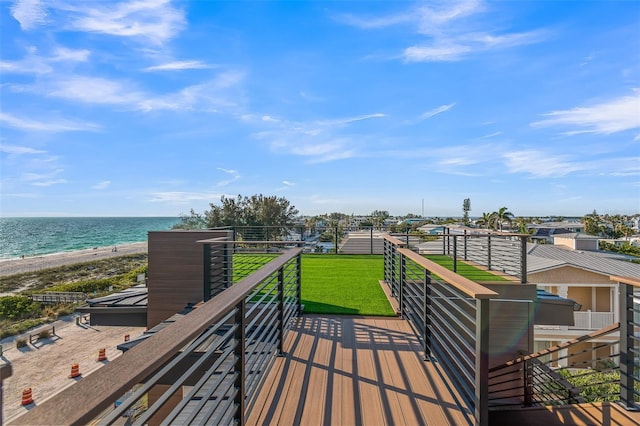 100 6th St S, Bradenton Beach, FL 34217 - wooden deck featuring view of water and beach