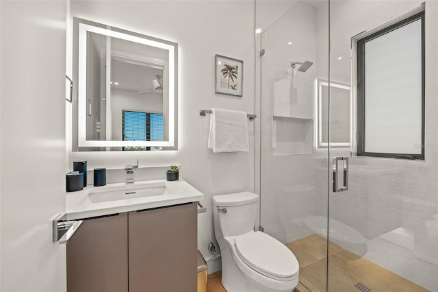 100 6th St S, Bradenton Beach, FL 34217 - full bathroom with toilet, vanity, and a shower stall
