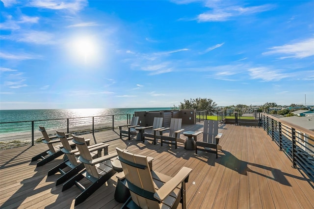 100 6th St S, Bradenton Beach, FL 34217 - wooden terrace featuring a water view