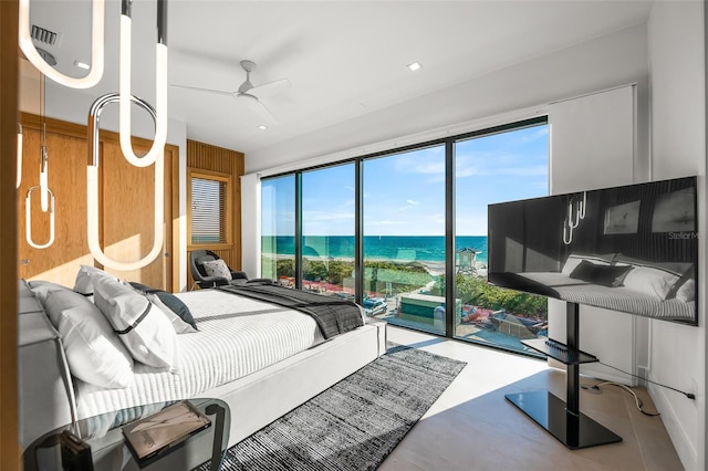100 6th St S, Bradenton Beach, FL 34217 - bedroom featuring a ceiling fan and access to outside
