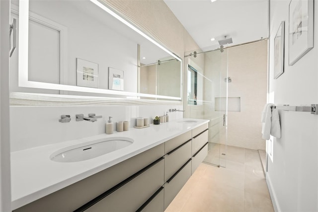 100 6th St S, Bradenton Beach, FL 34217 - full bath with a shower stall, double vanity, and tile patterned flooring