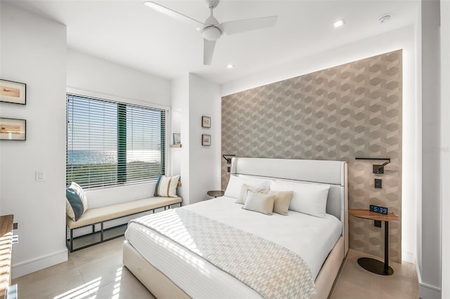 100 6th St S, Bradenton Beach, FL 34217 - bedroom with wallpapered walls, an accent wall, recessed lighting, ceiling fan, and baseboards