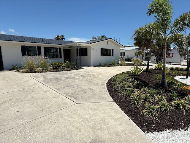 808 25th Ave W, Palmetto, FL 34221 - ranch-style house featuring stucco siding and metal roof